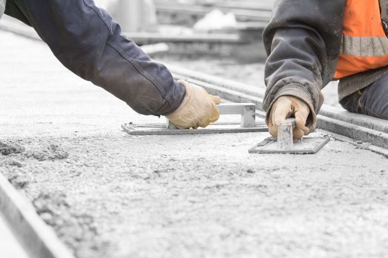 How Commercial Concrete Mudjacking Restores Uneven Surfaces